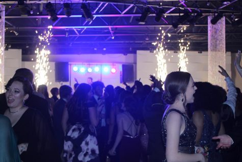 Seniors and their dates dance to the beat at prom on Saturday March 19.